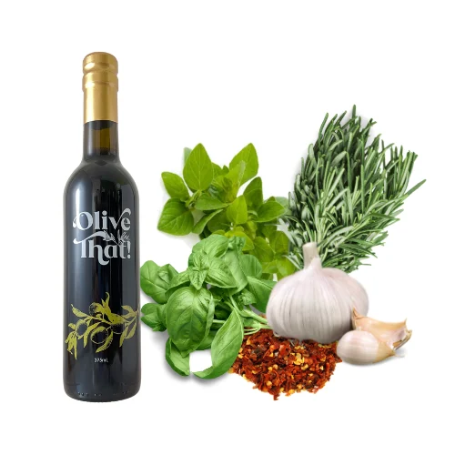 Tuscan Herb Infused Extra Virgin Olive Oil bottle with fresh herbs and garlic