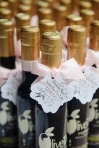 Standard 200ml Olive That! favour bottles with pink ribbon and custom wedding tag