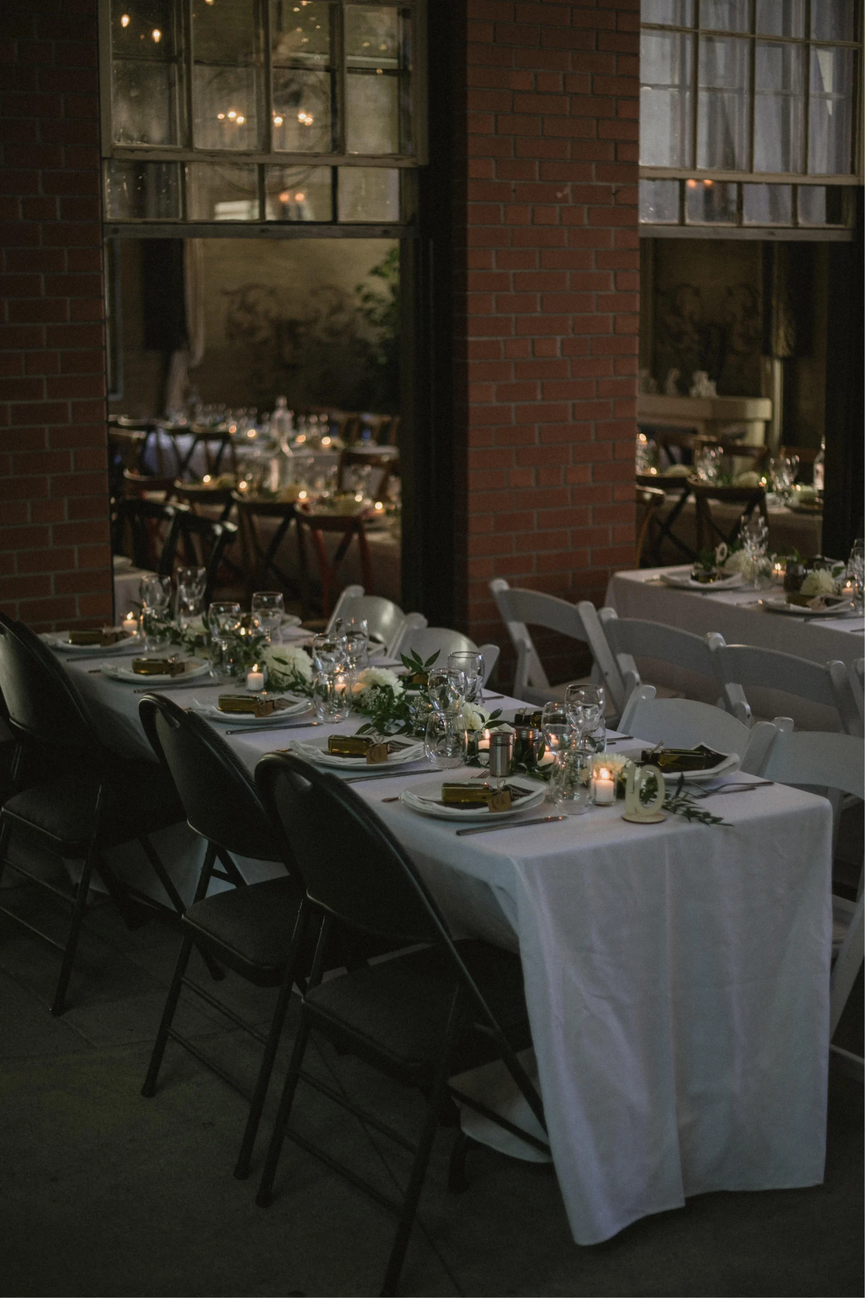 Overhead view of wedding place setting with Olive That! olive oil favour and personalized menu card